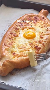 1.5K views | Khachapuri is a cheese-stuffed boat-shaped bread...