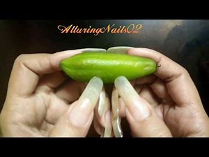 AlluringNails02 testing the strength of her natural long nails (video 3)