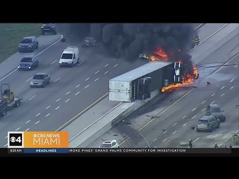 Semi-truck overturned, caught fire on Turnpike Extension