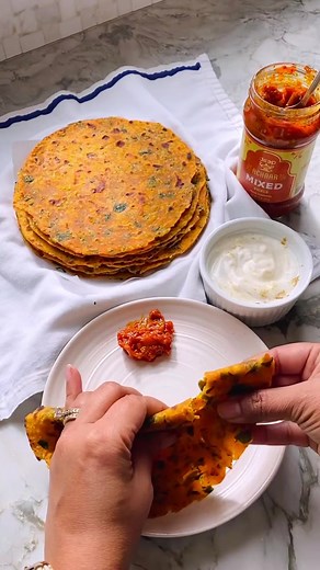 Methi Thepla with Sweet Potatoes 🌱 ⁠Thepla brings back such clear memories of my mom making “garam garam” for breakfast, always served with pickle, chutney, and yogurt. The aroma of fresh fenugreek leaves and sizzling ghee is not something you’re likely to forget nor is that amazing first bite of a Thepla served hot off the pan. ⁠⁠The full recipe is in the comments or you can google “ministryofcurry methi thepla” ⁠⁠#thepla #indiancuisine #vegetarianfood #desifood #indianfood #plantbasedrecipes 