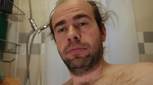 clip-1106822459-close-shirtless-man-rough-facial-hair-making