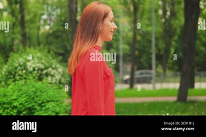 side view adult woman walking on the street Stock Video Footage - Alamy