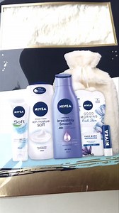 Nivea Winter Warmer Set Hot water bottle moisturizer lotion lip balm sheet mask | Sophia Collection