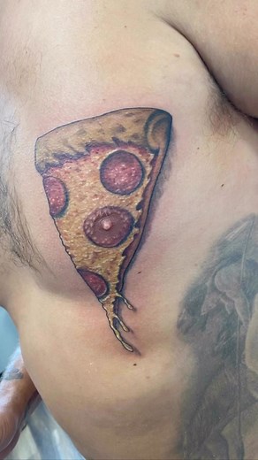 Pizza tattoo by @dollirium at @reverietattoostudio in La Plata, MD | TattooSnob.com