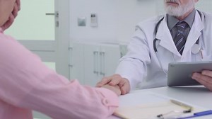 Medical Practitioner Talking Patient Clinic Holding Stock Footage Video (100% Royalty-free) 1051262512 | Shutterstock