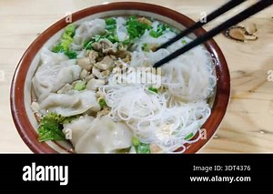 young asian man coughing and sneezes close up