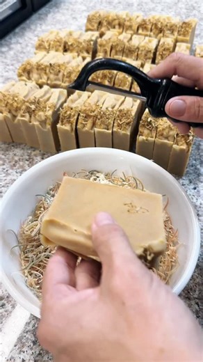 Calling all lemon lovers! Lemonlicious is a delightful combination of lemongrass and litsea cubeba that gives this soap a deep, rich lemony scent. Each bar is topped with calendula petals and hand stamped. This yummy scent is also available in a matching goat milk lotion. #ForTheLoveOfLemon #LemonGoatMilkSoap #LemonGoatMilkLotion #SoapMaker #TheYummySoap #FYP #MadeInAlabama #EveryIngredientMatters #HealthySkincare #Apothecary #TheYummySoapCo #HolisticLiving | The Yummy Soap Co, LLC.