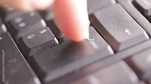 italy blur abstract finger tiping a code in keyboard with noise and dirty real work background