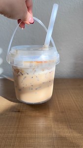 Coffee in a bucket is just so much better 🪣🎀 • 2tsp instant espresso • 2-3oz water • 1tbs caramel sauce • 1tbs vanilla syrup • lots of ice • whole milk (6ish ounces) • vanilla cold foam • caramel drizzle #coffee #coffeebucket #cafecito #coffeeathome #explore #fyp | Cafecitopls