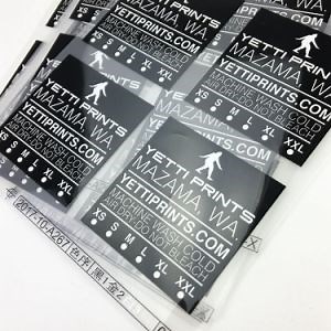 [Hot Item] Tagless Iron on Neck Heat Transfer Clothing Care Label Sticker Garment Labels for T-Shirt