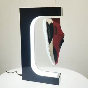 High Tech Rotating Magnetic Shoe Stand Fashion Female Display Shoe Stand Magnetic Shoe Stand for Window Exhibition