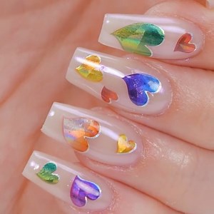 115K views · 4.2K reactions | Easy nail art for beginners: Sculpted coffin nails with Heart stickers & Chrome pigment. | Naio Nails UK | Facebook