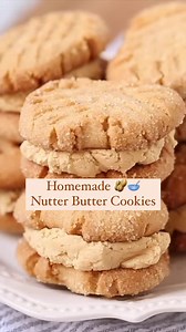 Homemade Nutter Butter Cookies 🥜🥣🧈 Soft, chewy peanut butter cookies filled with luscious peanut butter cream 🤩 I love the original too, but these are soooo much better than packaged cookies!! But don't just take my word on it...this recipe has dozens of 5⭐️ reviews!! #cookiebaking #peanutbuttercookies | The Soccer Mom Blog - Positive Inspiration for Moms