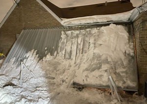 Woman trapped for hours beneath collapsed snow-laden canopy - The Weather Network