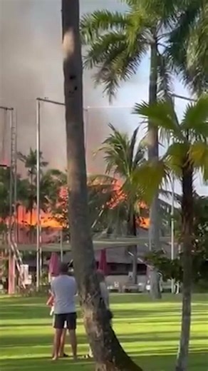 Guests watch on as flames tear through Bali resort