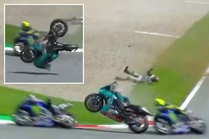 Watch 200mph horror crash as MotoGP riders collide and Rossi cheats death