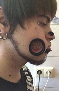 Stretched Piercings Made to Extreme: Joel Miggler's Cheek Holes
