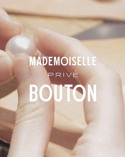 MADEMOISELLE PRIVÉ BOUTON. The spirit of couture meets the ingenuity of watchmaking. This secret watch reinterprets the button, a signature of CHANEL style. Here, it is adorned with a 15 mm cultured pearl, an exceptional size that requires two years of maturation. #MademoisellePriveBouton #CHANELHauteHorlogerie Discover the collection on chanel.com/-Mademoiselle.Prive.Bouton | CHANEL