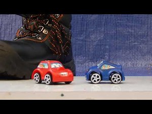 Stomping toy cars with work boots
