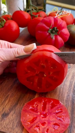PESTO FLATBREAD WITH HEIRLOOM TOMATOES Crispy, fluffy flatbread loaded with fresh homemade pesto, juicy heirloom tomatoes, and peppery rocket—it’s the perfect summer bite. Totally plant-based and bursting with flavour. This recipe makes 2 large flatbreads and is so worth it. Save this one for your next lunch or easy dinner idea! Ingredients makes 2 large flatbreads Bread dough 500g bread flour 350ml lukewarm warm water 7g instant yeast 1 tsp brown sugar Pinch salt Pesto 100g pine nuts 2 tbsp nut