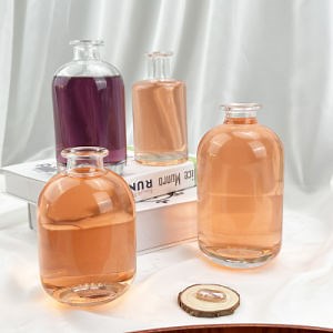 [Hot Item] Factory Supplier 500ml Round Liquor Glass Bottle Vodka Whiskey Glass Juice Bottle with Cork, Stoppers