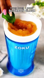 This bourbon slush with peach and hot honey is the ultimate cool and spicy treat for summer! It combines frozen peaches, bourbon, bitters, hot honey, basil, and a dash of Tajin. No need for a blender or ice! INGREDIENTS: 8oz Peach Juice 2 oz bourbon 3 dashes of Angostura bitters ½ ounce hot honey 1 basil leaf Dash of Tajin METHOD: Pour peach juice into the frozen core of the ZOKU Jumbo Slush. Stir and scrape as the slush thickens. Pour 2oz bourbon. Alcohol can only be added after initial ingredi