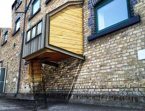 James Furzer designs modular parasitic pods to help shelter London's many "rough sleepers"