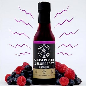 Keep your summer sizzling with our Ghost Pepper & Blueberry Hot Sauce. Follow our page for awesome recipes, videos & more! #TeamBravado www.bravadospice.com | Bravado Spice