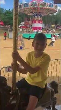 Riding the Carousel at the County Fair, May 2022