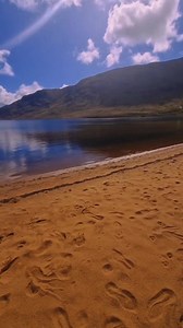 Standing on the peaceful shores of Loch Na Fooey... A beautiful place hidden among the hills! 🚣🏖️⛰️❤️ 📸 Kevin Freeman Photography 📍 Loch Na Fooey, Finny, Clonbur #Sand #Beach #Lake #Mountains #Picturesque #Peaceful #Remote #Wild #LochNaFooey #JoyceCountry #Finny #Clonbur #Galway #Ireland #VisitGalway | Visit Galway