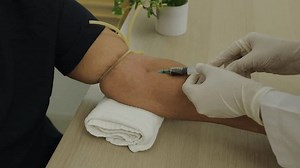 clip-3957473159-close-doctor-nurse-taking-blood-sample-arm