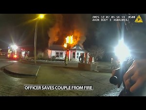 Body camera shows southern Indiana officer rescuing couple from burning home