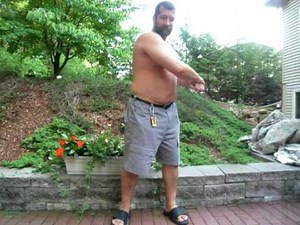 Chubby Musclebear Flexes Muscles and Gut short while after workout