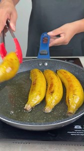 Fry 4 bananas with the peel in hot oil until golden.#recipe #food | Watch Recipes