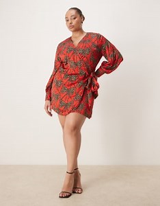 Never Fully Dressed Plus satin wrap tie side mini dress in red leopard bow print | ASOS