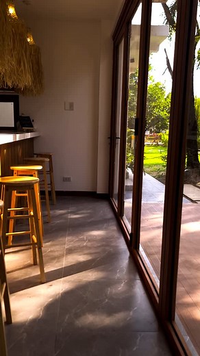"Serving up tropical vibes and warm aesthetics—where rustic charm meets modern minimalism. Who else is dreaming of breakfast at this bar?" #KitchenGoals #InteriorInspo #BohoStyle #ModernRustic #HomeVibes #DesignInspo #StorijModules #storij #modularcabinetph | Storij Modules