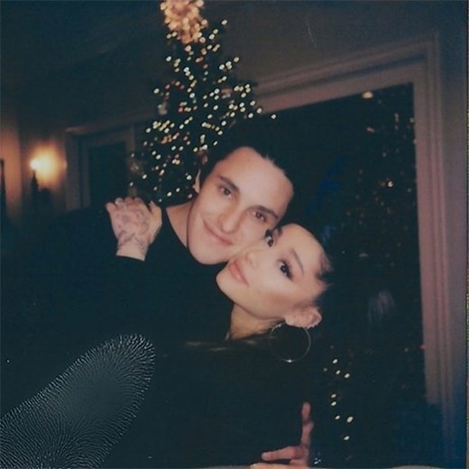 Ariana Grande and Fiancé Dalton Gomez Get Cozy at Family Christmas Celebration