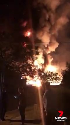 Firefighters say the petrol station explosion in Campbelltown was so intense that the house next door began to melt at the height of the fire. Fireballs reached as high as 20 metres at the Westside Petroleum when a petrol tanker, the service station store, LPG cylinders and cars burned after 10pm last night. Sixty firefighters worked for 5 hours to bring the Lindesay Street blaze under control. No one was injured in the initial incident, but a firefighter was taken to hospital with a wire cut. M