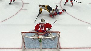 Sidney Crosby scores after diving over T.J. Oshie