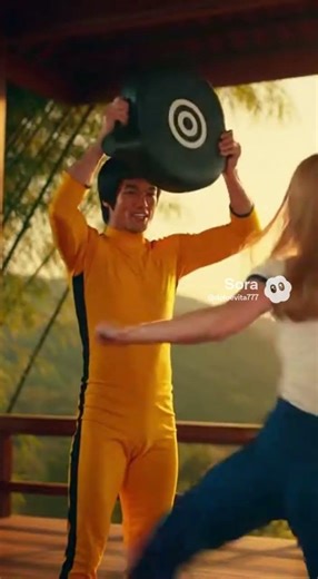 Bruce Lee teaching high kicks to Marilyn Lange