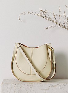 3.2K views | This cream colored leather shoulder bag is the perfect finishing touch to any outfit #handbag #leather #womensfashion | Mirror Mirror | Facebook