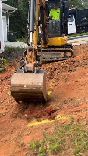 Simplicity at its finest. The hardscape, softscape, and landscape lighting combo making this front yard pop 💥 A unique low-maintenance alternative to the typical grass front lawn! #outdoorliving #shehanlandscaping #landscaping #landscapedesign #retainingwalls #softscape #excavators #skidsteer #stonework #mulch #hardscapedesign | Shehan Landscaping