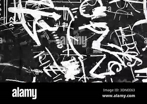 High contrast black graffiti texture, aggressive white paint lines, chaotic hand drawn shapes, raw abstract street art pattern, scratched urban surface, dirty ink strokes, distressed grunge background, expressive monochrome illustration Stock Video Footage - Alamy