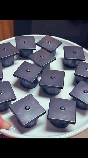 How adorable are these graduation treats? 🎓 Made with luscious Swiss milk chocolate and my special recipe peanut butter filling, it’s perfect for a graduation party or for gifting! #graduation #chocolate #swiss #peanutbutter #treat #sweet #giftideas #dessert #sheikysconfections | Sheiky's Confections