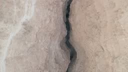 Aerial view of a canyon in the desert, Barak river, Negev, Israel.