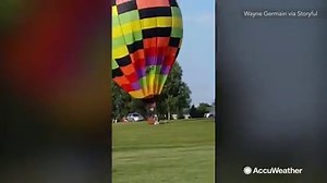 32K views · 177 reactions | VIDEO: A strong gust of wind came at the worst possible time when the pilot dangled from a hot air balloon in Chatsworth, Illinois and fell off. | AccuWeather | Facebook