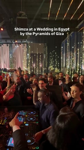 Cairo Spots on Instagram: "Shimza performing during a private wedding in Giza, with the Pyramids forming the backdrop of the night. The set brought an Afro house sound into an intimate celebration, blending contemporary music with one of Egypt’s most historic locations. Moments like this reflect how Egypt continues to host international artists across both public events and private celebrations. Video by @mr.backstage1 Follow @cairospots, visit our website cairospots.com and download our Cairo S
