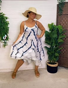 Our ‘ADRIANNA’ Tie-Dye Handkerchief Hem Womens Dress is a must-have for the Summer Season. One Size fits up UK Size 18. #boobalooboutique #tiedye #dress #summeroutfit #curvystyle #effortlessstyle #fashionforall #womensfashion #plussizefashion #trending | Boobaloo Boutique