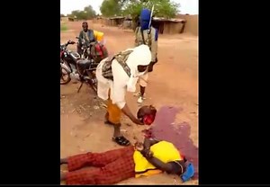 Beheading video- Terrorist beheads a man with a knife in Nigeria - XGore - Extreme Gore Videos