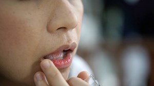 Asian Girl Use Finger Apply Lip Balm Moister Stock Footage SBV-338599501 - Storyblocks